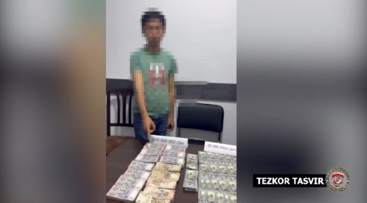 В Карши мужчину задержали при получении 100 млн сумов и 20 тыс. долларов США - видео