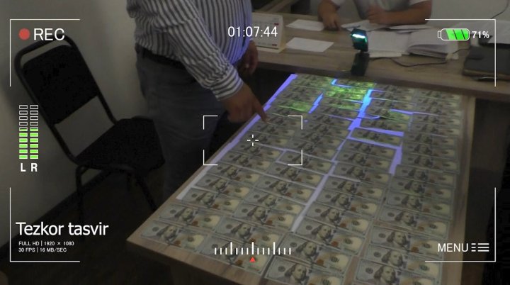 Заместитель руководителя кластера в Бухаре задержан при получении 9 тыс. долларов США