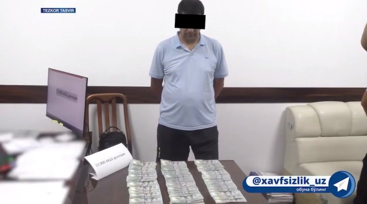 В Бухаре сотрудник органов внутренних дел задержан при получении крупной взятки