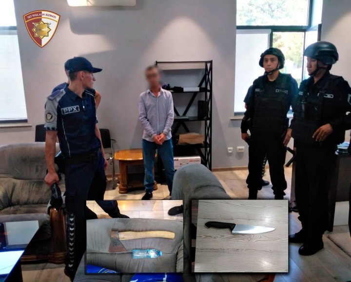 Охранник одной из организаций Ташкента требовал повышения зарплаты, угрожая начальнику топором